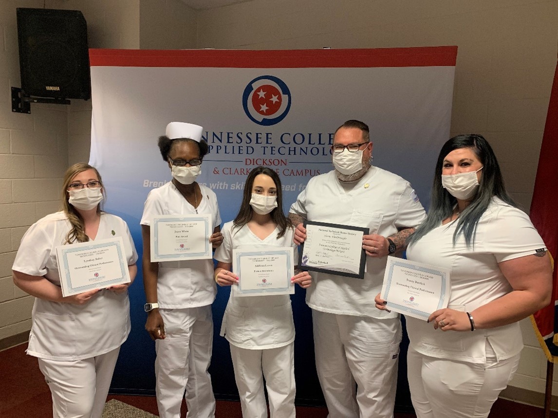 Lyndsay Baker, Joyce White, Addison Lucas, Shane VanDeweghe and Stacey Burdick (left to right) display their certificates of achievement presented during the pinning ceremony. Lyndsay Baker, Joyce White, Addison Lucas, Shane VanDeweghe and Stacey Burdick (left to right) display their certificates of achievement presented during the pinning ceremony.